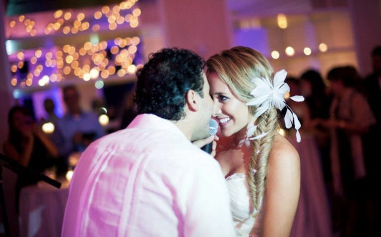 Bride and Groom Touch Foreheads While Dancing at The Ritz-Carlton Bal Harbour | PartySlate