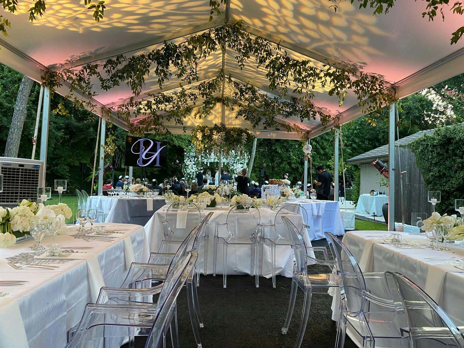 Small Backyard Wedding Tent Reception With Creative Lighting | PartySlate