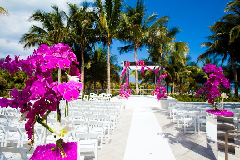 Modern Wedding Ceremony With Hot Pink Orchids at The St. Regis Bal Harbour Resort, Bal Harbour | PartySlate