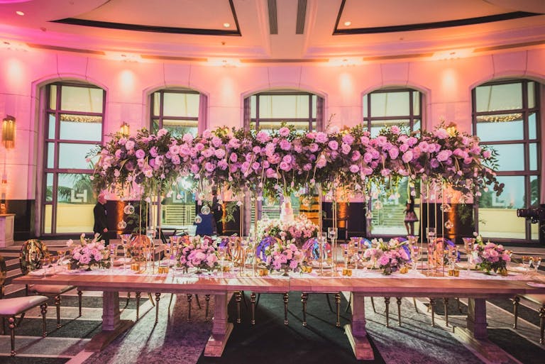 Pink Floral Wedding Reception at Loews Miami Beach Hotel | PartySlate