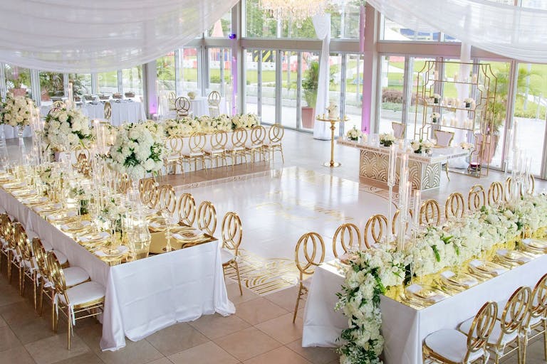 Bright and Airy Wedding With Gold Seating and Floor-to-Ceiling Windows | PartySlate