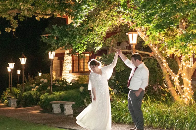 Bride and Groom Dance Outside at The Grove Wedding Venue in Glenview, IL | PartySlate