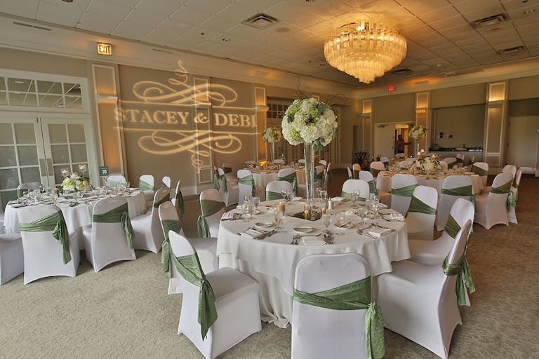 White and pale green wedding with monogrammed lighting at The Grove Country Club in Long Grove, IL | PartySlate