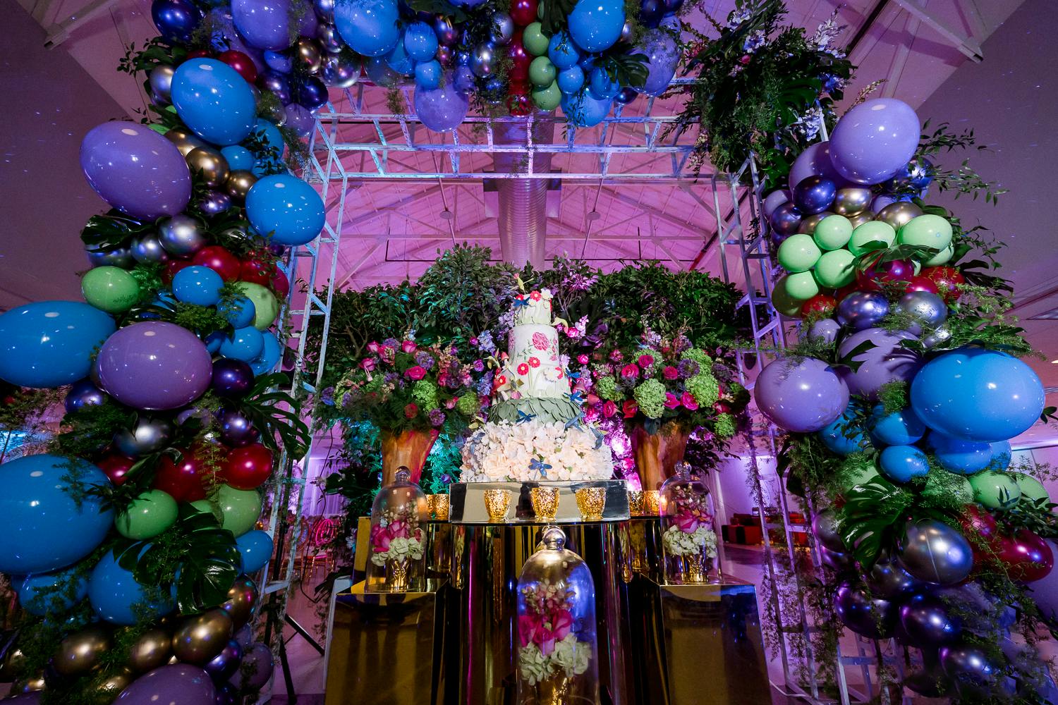 Jewel-Toned Garden Cake and Balloon Arch for Colorful Quinceañera | PartySlate