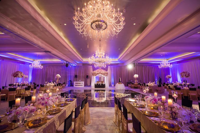 Glamorous Wedding Reception with Purple Uplighting at The St. Regis Atlanta in Atlanta, GA | PartySlate