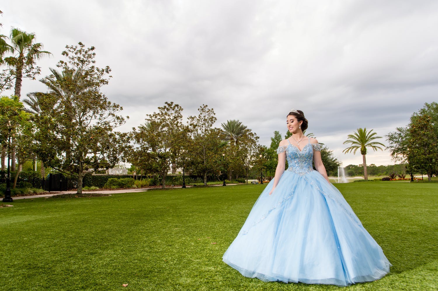 Quinceañera wears blue Cinderalla-style ballgown for her quinceañera celebration | PartySlate
