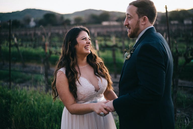 Bride and Groom’s first look outside Casa Real at Ruby Hill Winery in Pleasanton, CA | PartySlate