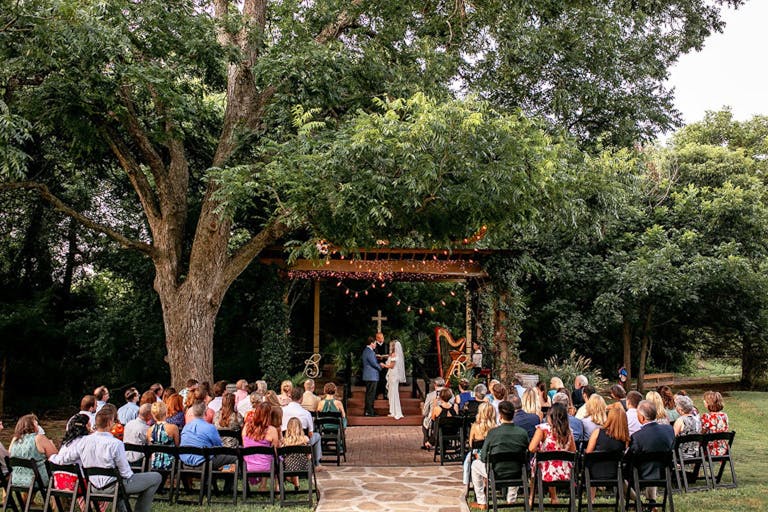 Christian wedding ceremony at Bernhardt Winery in Plantersville, TX | PartySlate