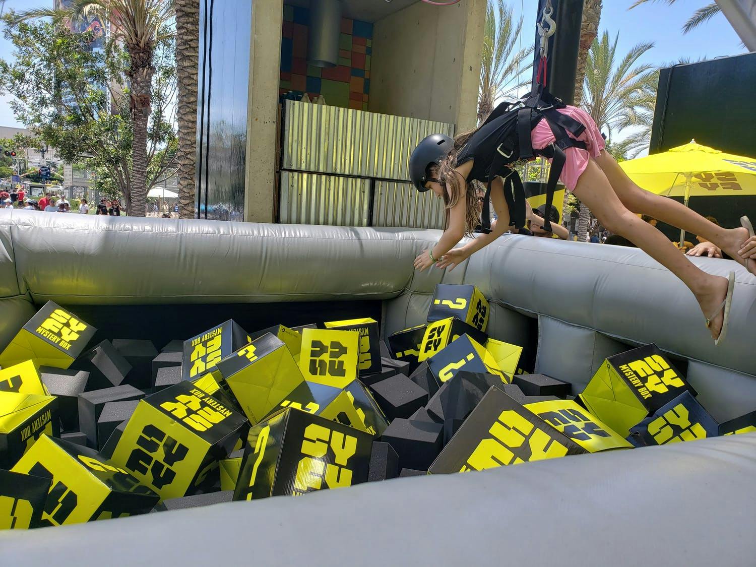 Human claw machine, one of PartySlate's most creative corporate event ideas | PartySlate