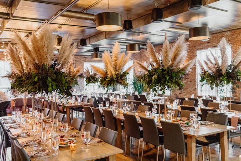 Rose Gold Wedding with greenery and pampas great centerpieces at Loft Lucia in Chicago | PartySlate