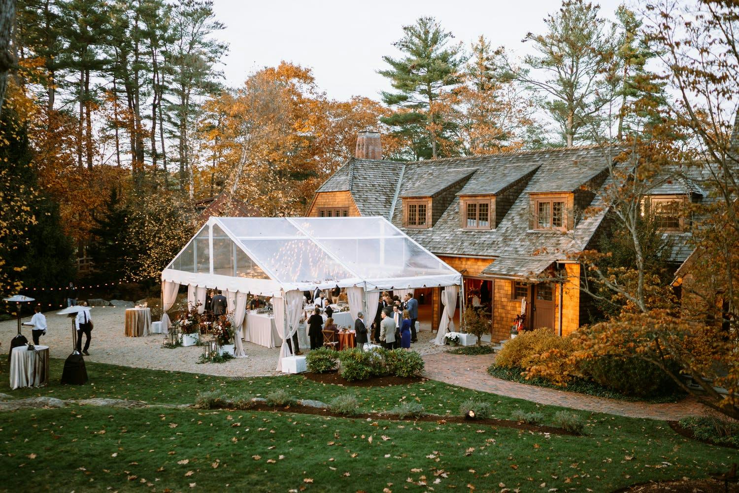 Rustic fall wedding with transparent tenting | PartySlate