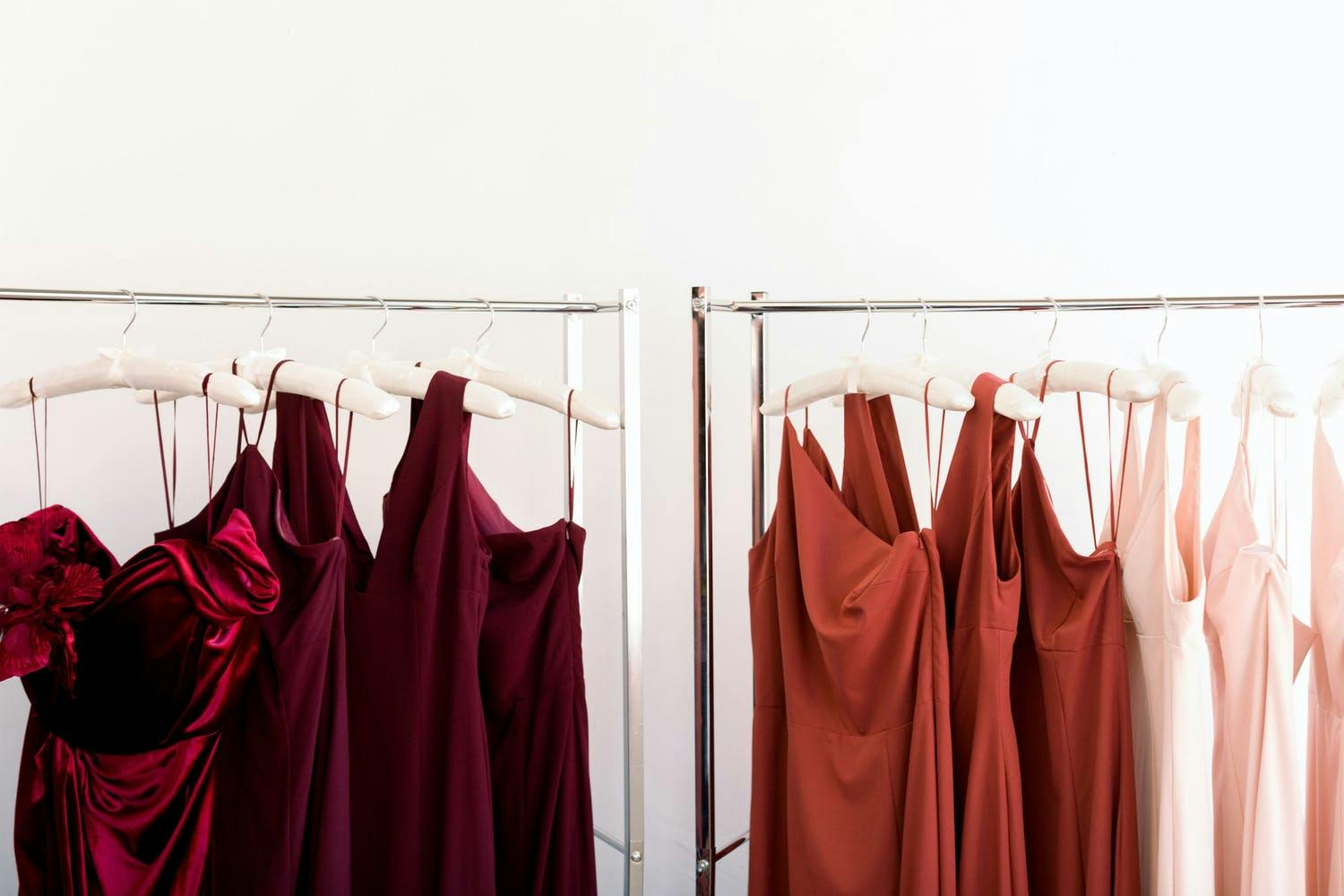 Fall bridesmaid dresses in the same red color family | PartySlate