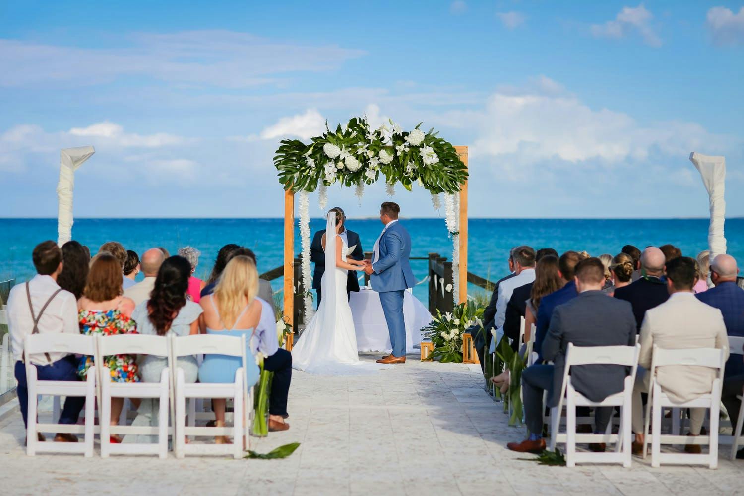 Small beach wedding ceremony at 23 North, Grand Isle Resort and Spa | PartySlate