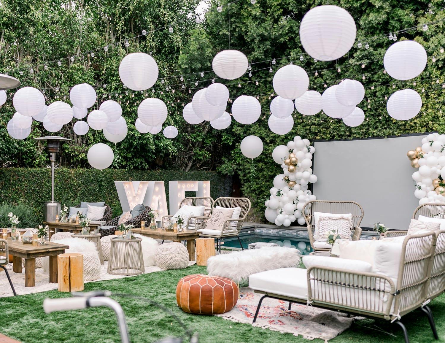 Backyard Bat Mitzvah Party with Boho Décor and Home Movie Projection Screen | PartySlate