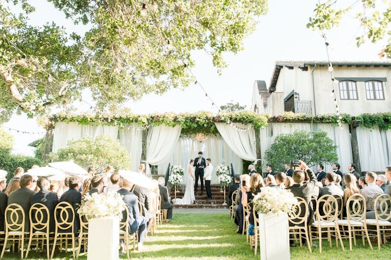 Indoor and Outdoor Wedding Ceremony with Tented Alter | PartySlate
