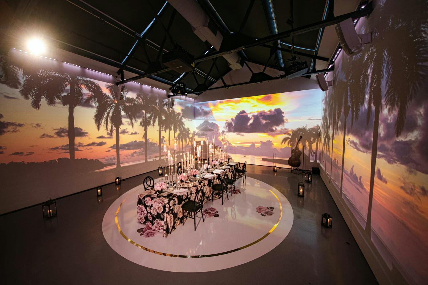 Intimate, hybrid wedding tropical sunset projection mapping | PartySlate