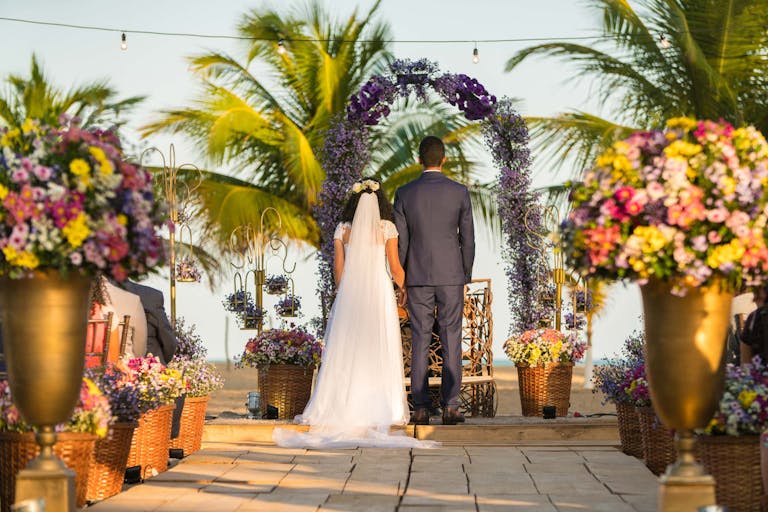Colorful Floral Beach Wedding at Bungalows Key Largo | PartySlate