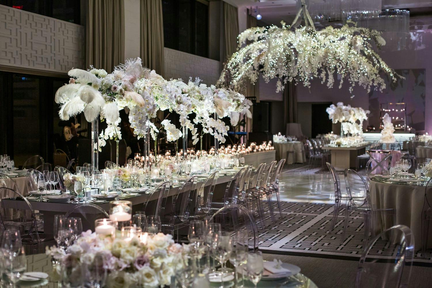 Winter wedding at The Langham, Chicago with white floral décor and centerpieces | PartySlate