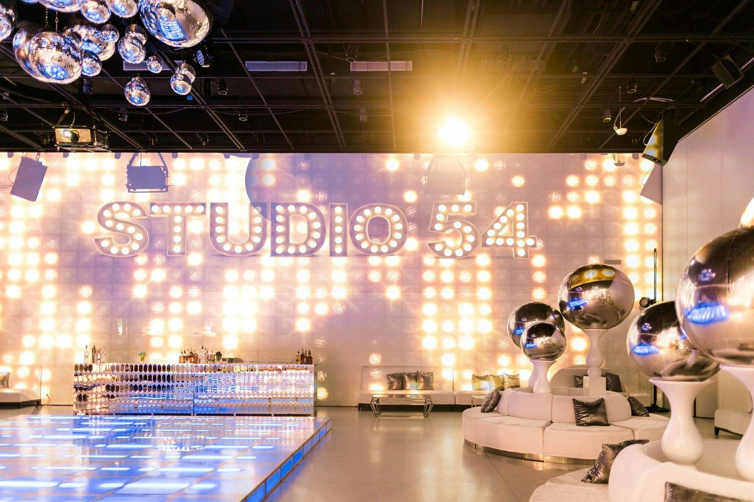 Studio 54 wedding reception with dance floor | PartySlate