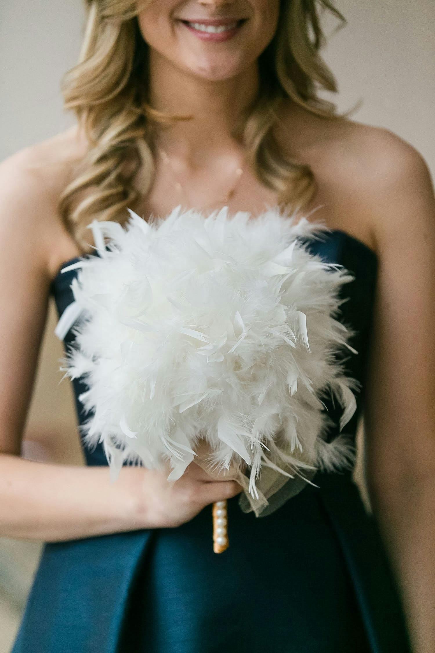White feather wedding bouquet | PartySlate