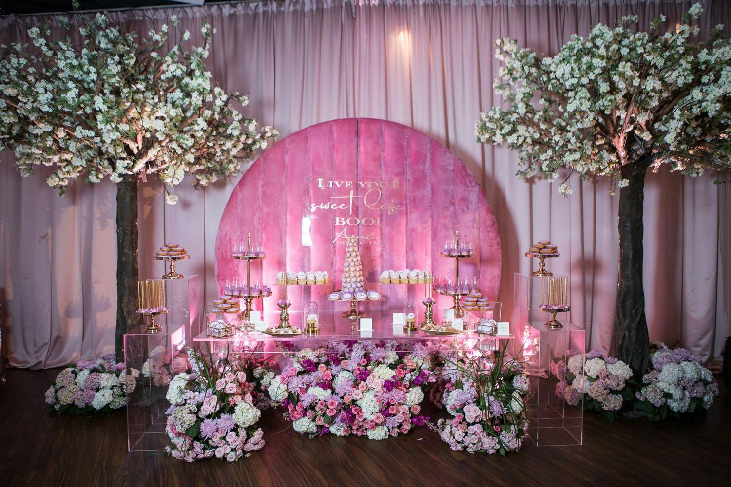 Enchanted garden launch with pink décor for Aventer Gray | PartySlate