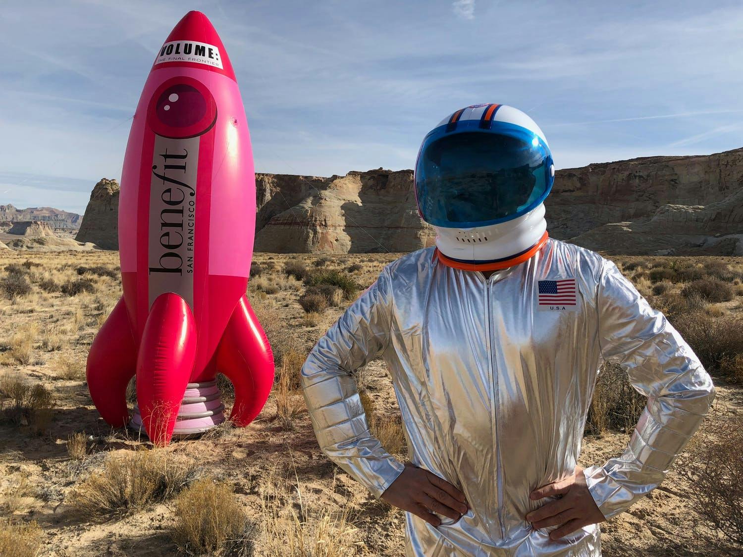 Benefit Cosmetics global launch in desert with pink rocket and costumed astronaut | PartySlate