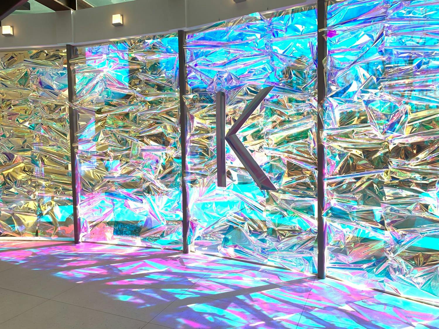 Iridescent signage for Kerastase product launch | PartySlate