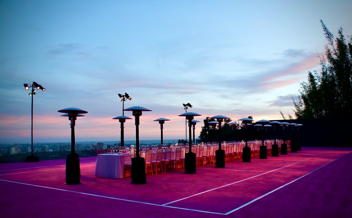 Outdoor pink launch event on tennis court in Los Angeles | PartySlate