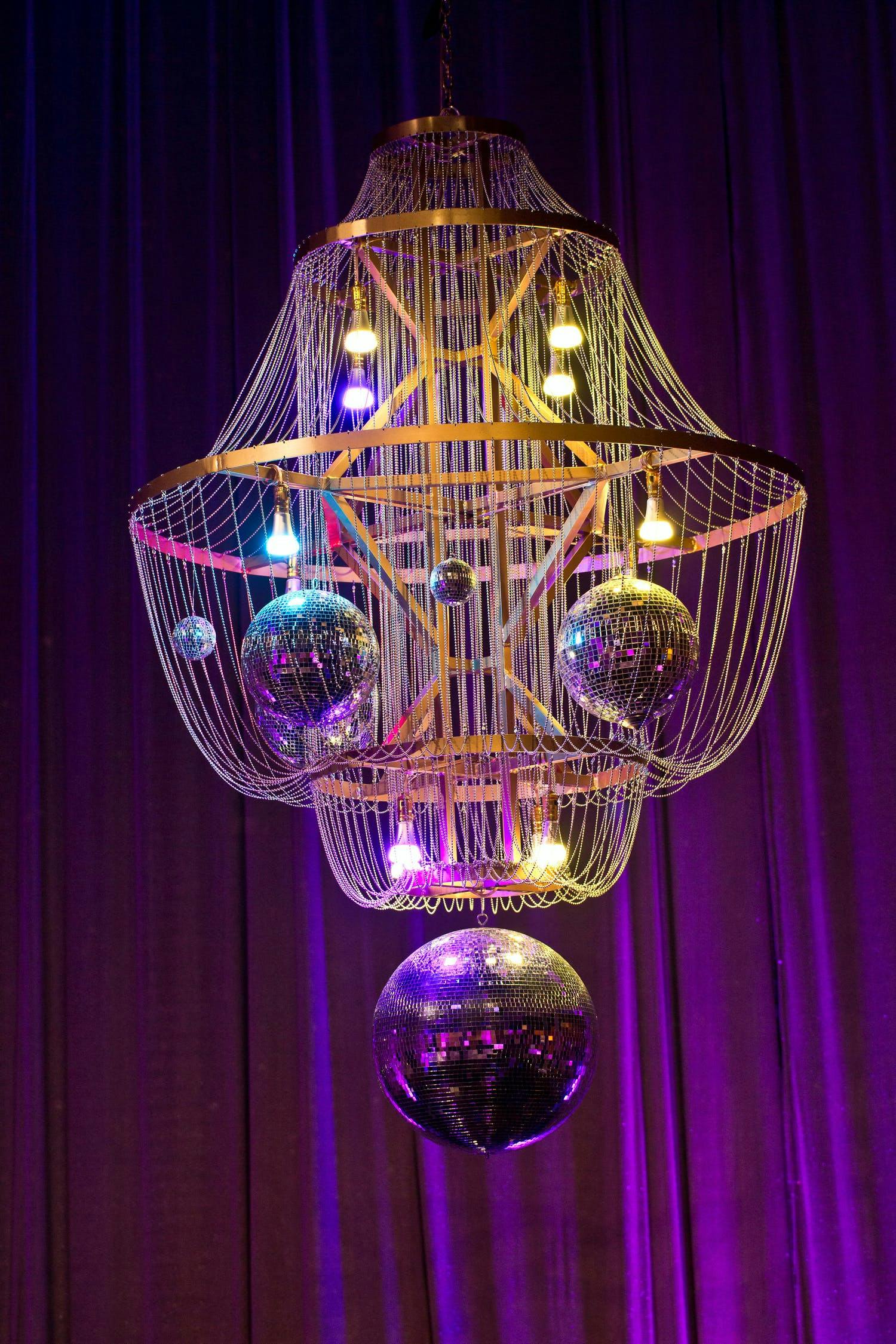 Wedding chandelier with disco balls | PartySlate
