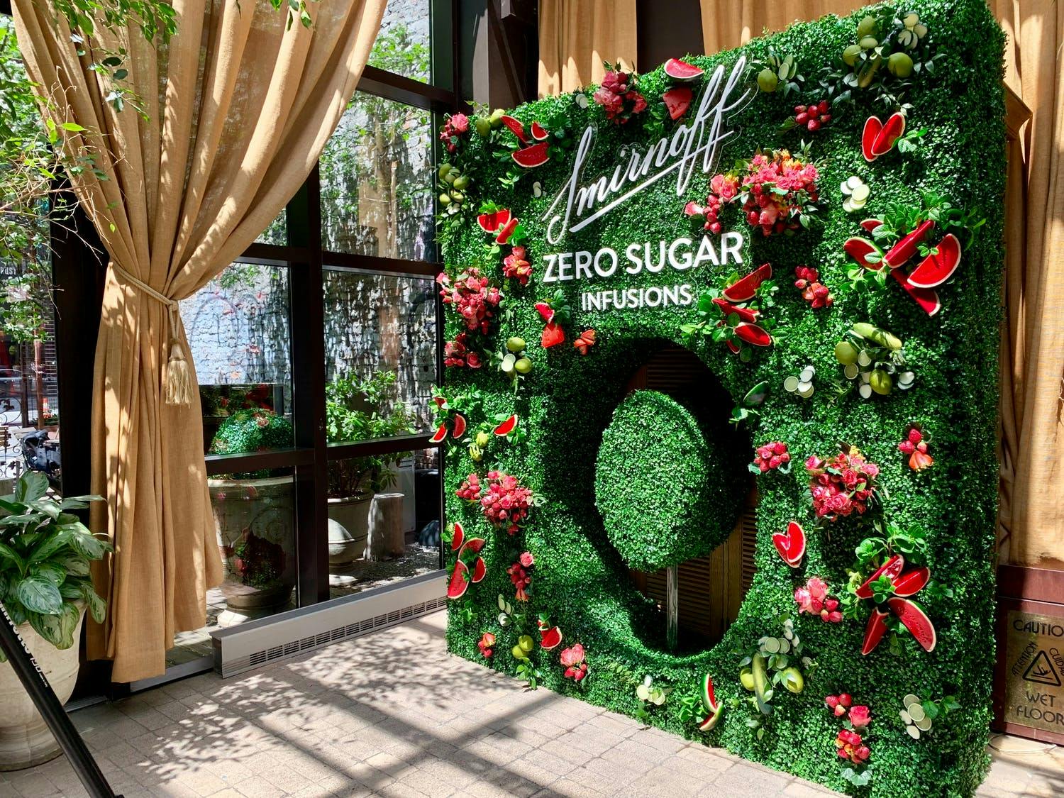Boxwood signage with fruit décor at Smirnoff Zero Sugar Infusions launch | PartySlate