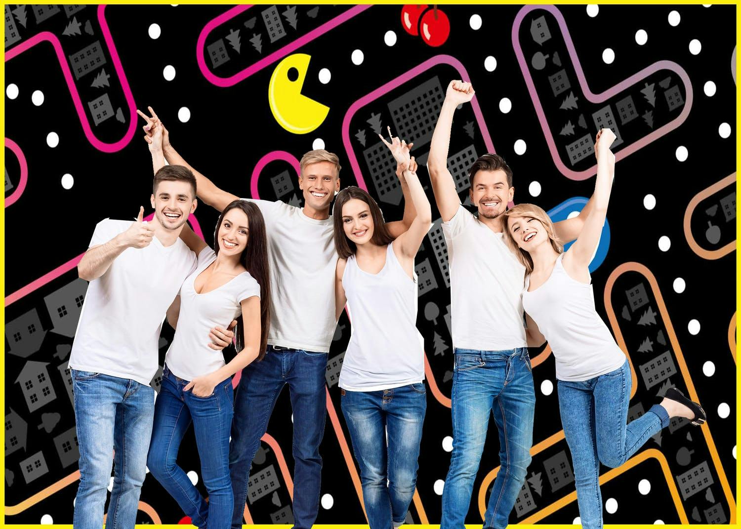 Friends pose in front of green screen photo booth with pac-man backdrop | PartySlate