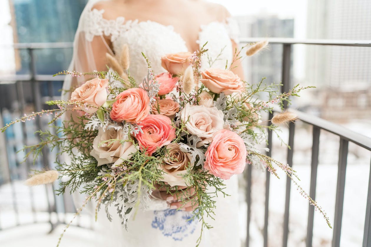 Dreamy pink winter wedding bouquet | PartySlate
