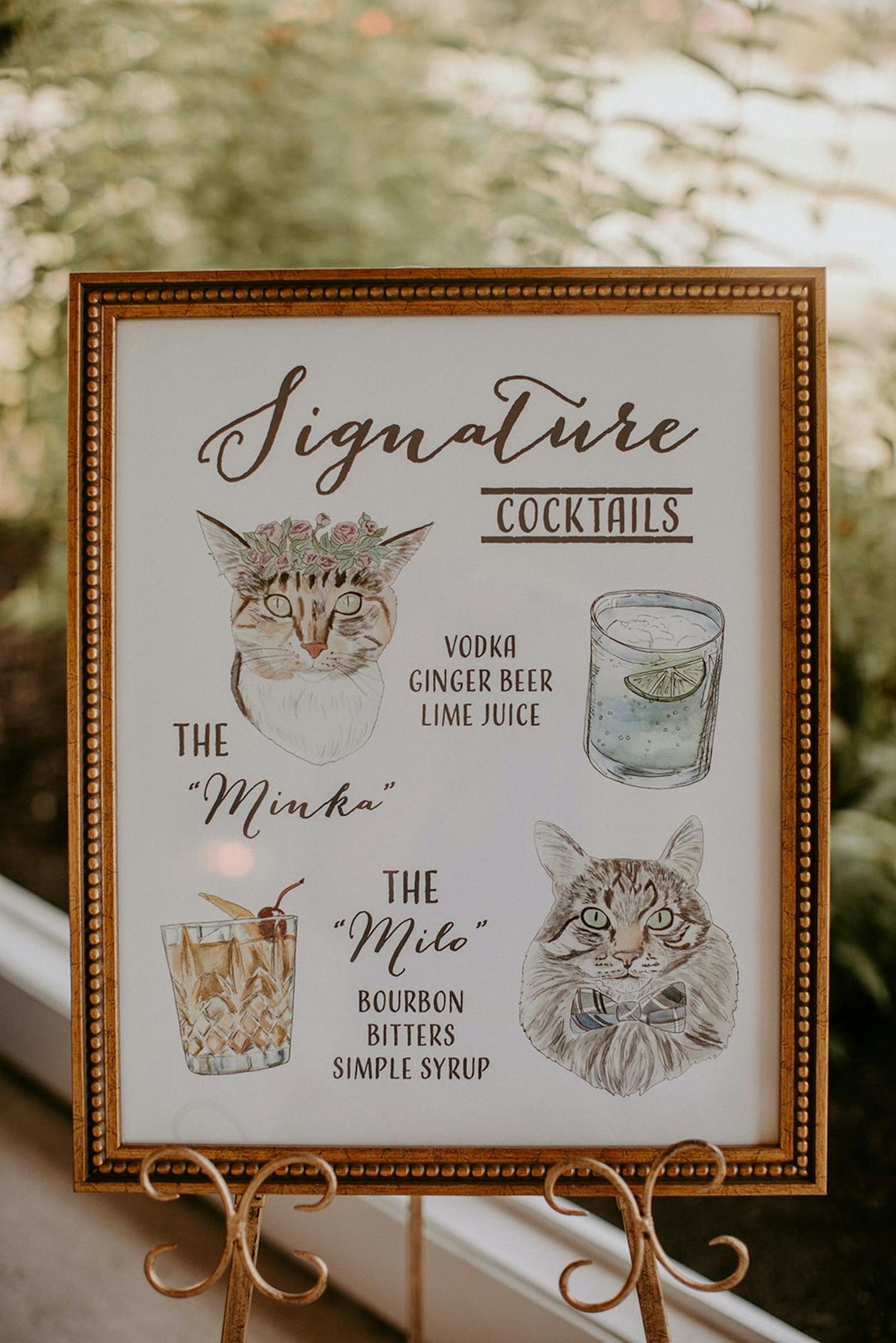 wedding cocktail menu with drawings of cats on it | PartySlate