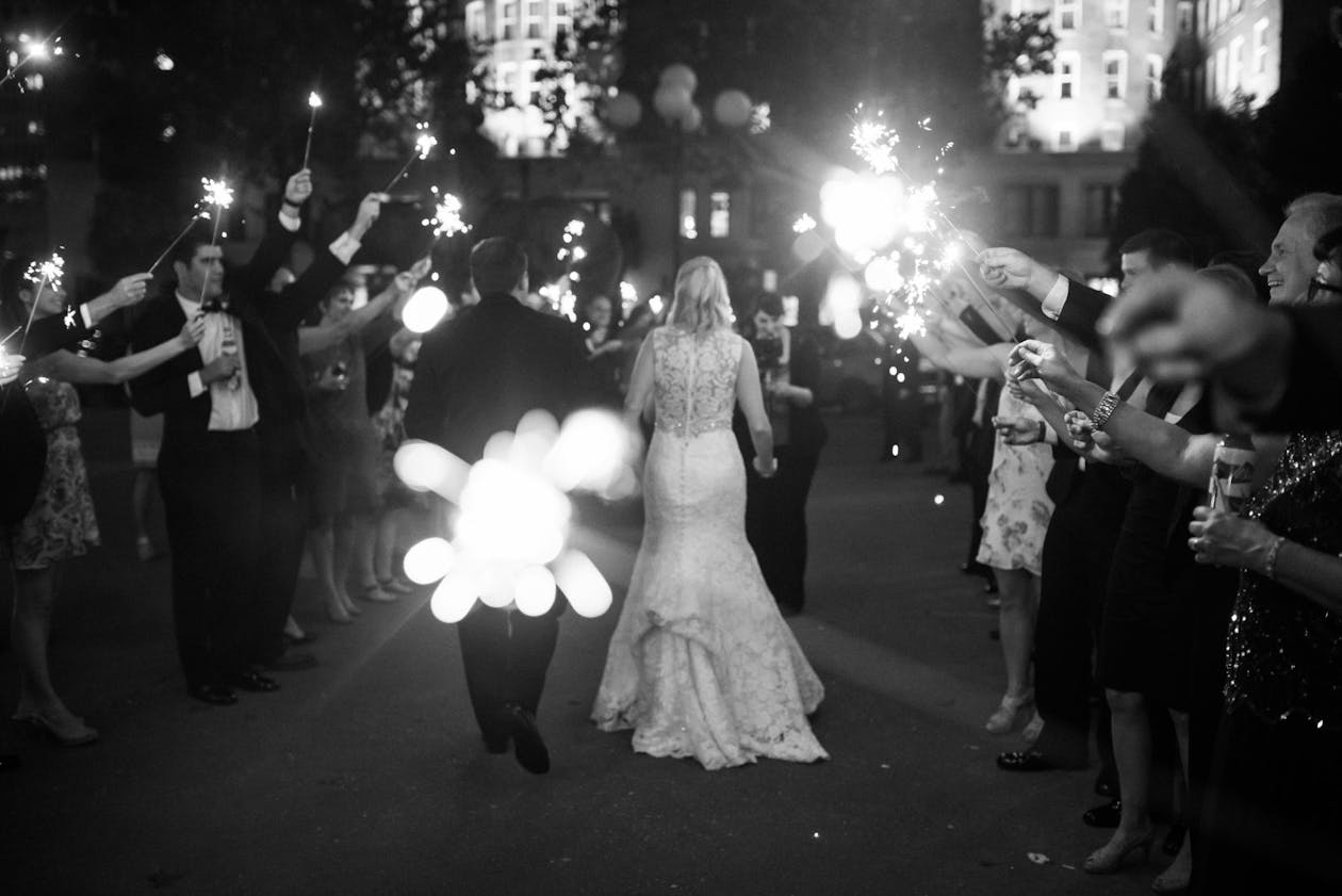 Black and White Photo of Romantic Wedding in Oklahoma City With Sparklers Wedding Exit | PartySlate