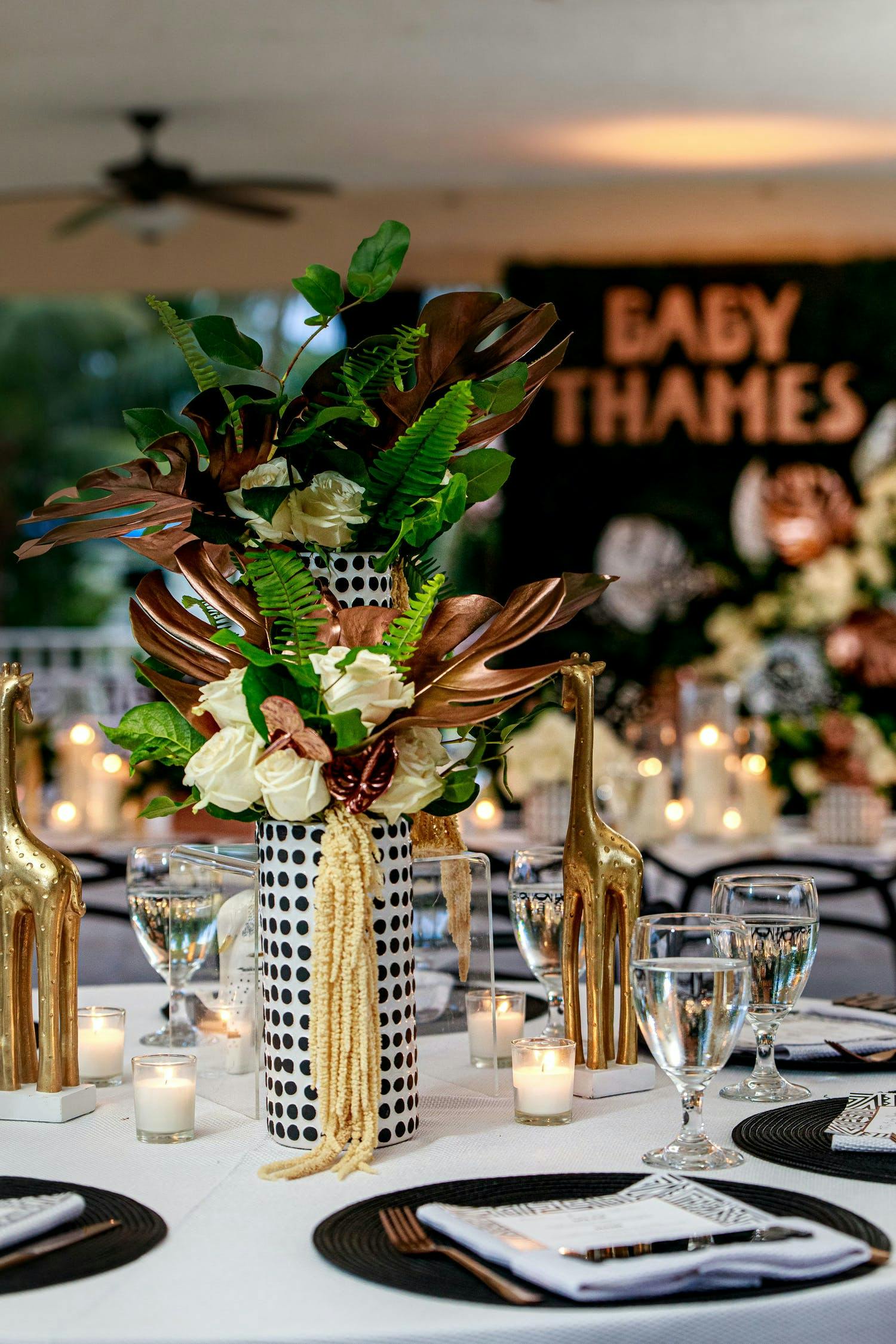 Gold and green jungle theme baby shower centerpiece | PartySlate