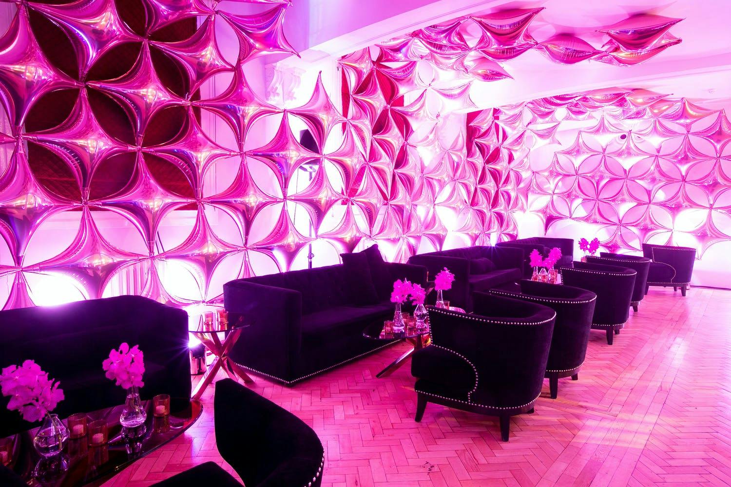 Modern quinceañera lounge area in hot pink colors | PartySlate