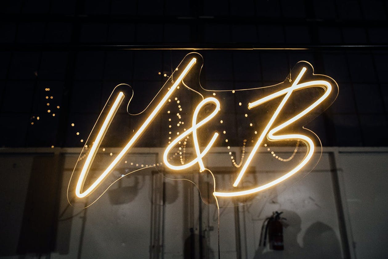 V & B Monogram Neon Sign on Wall | PartySlate