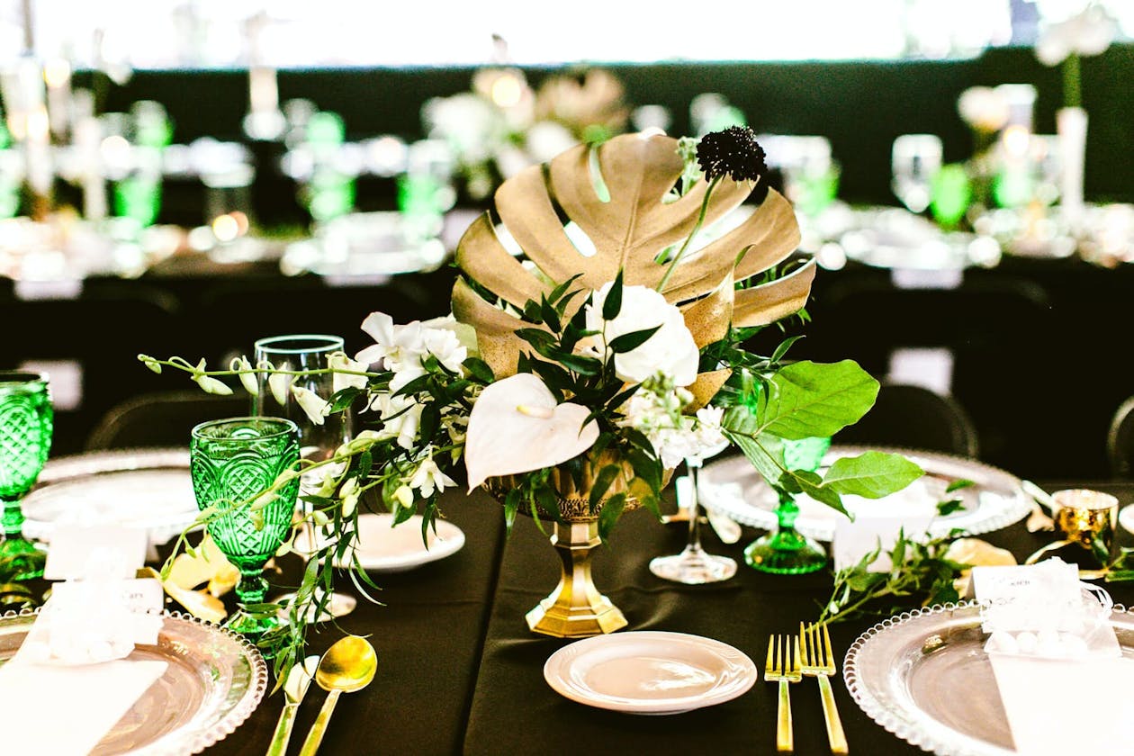 Art Deco wedding with gold palm leaf centerpiece | PartySlate