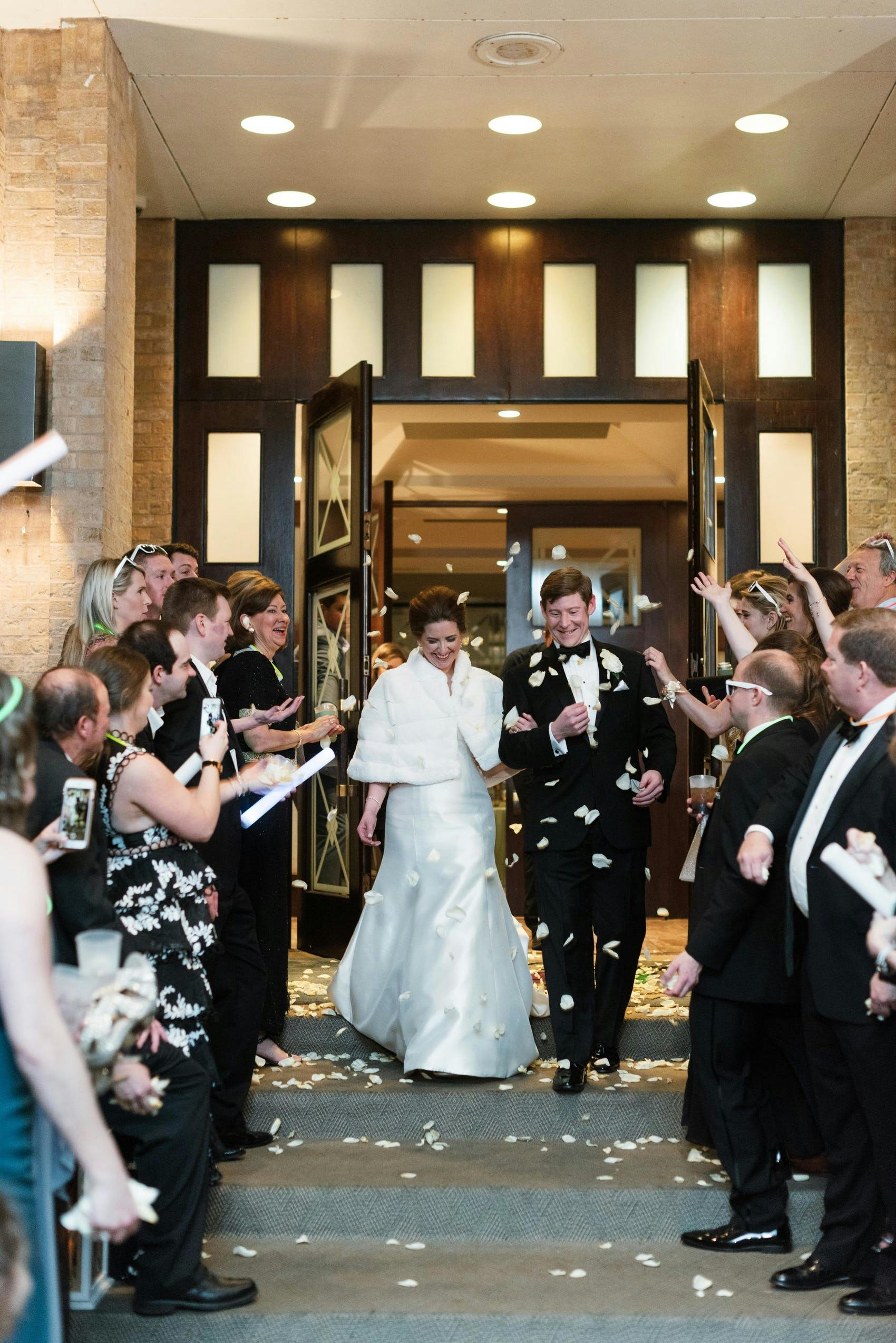 Christina Leigh Events Wedding Exit With Rose Petals | PartySlate