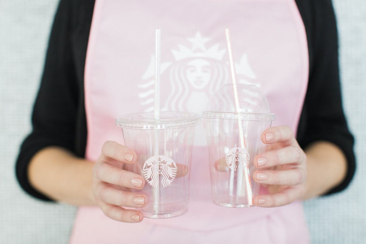 Starbucks Coffee Barista Themed Party With Pink Aprons and Starbucks Cups | PartySlate