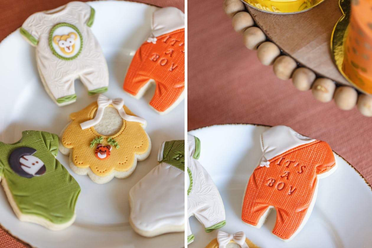 Frosted baby shower cookies in orange, green, and yellow | PartySlate