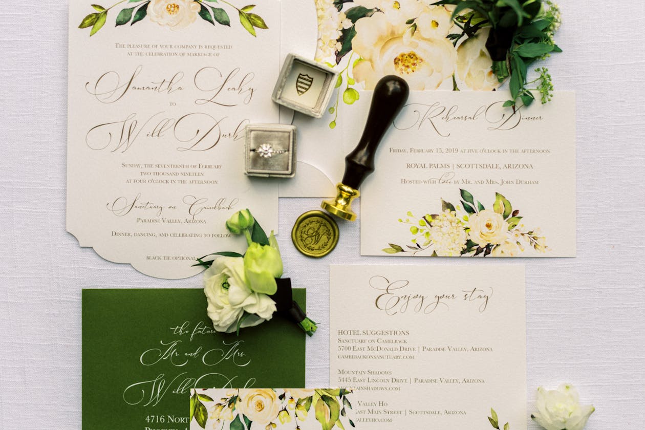Green and cream wedding invitations with vintage wax seal | PartySlate