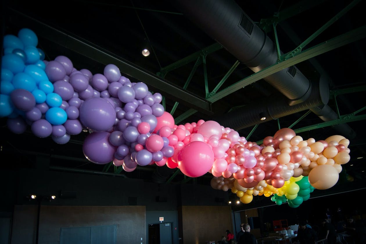 Rainbow balloons at whimsical Chicago wedding | PartySlate