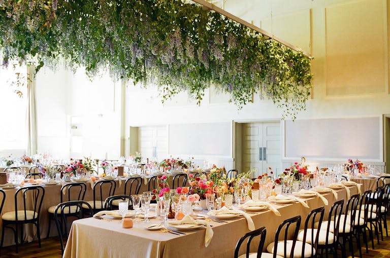 Wedding At Cavallo Point Lodge San Francisco Wedding Venue With Table Set and Floral Ceiling Installation | PartySlate
