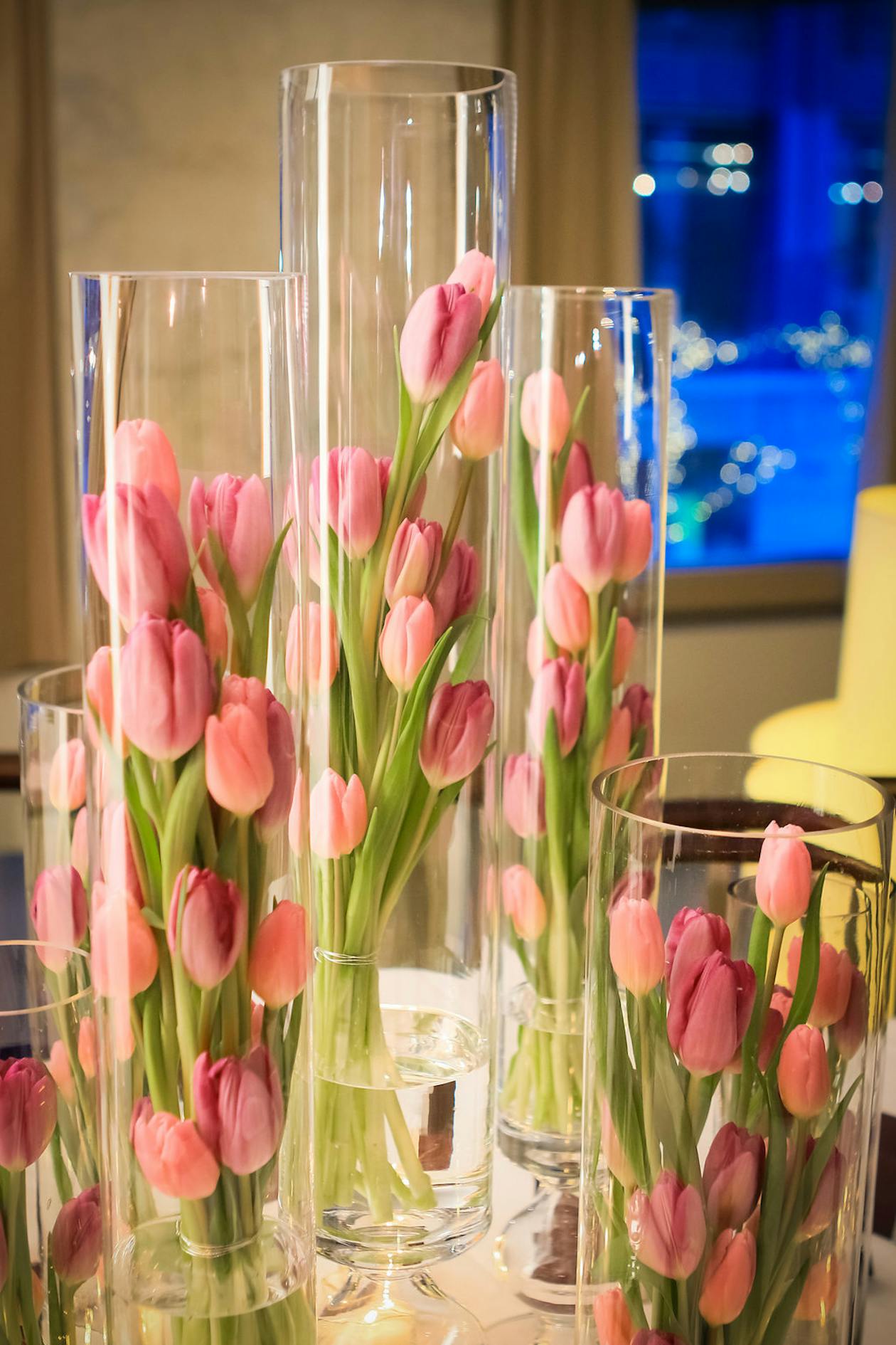 Colorful Pink Tulip Wedding centerpiece In Glass Jars | PartySlate