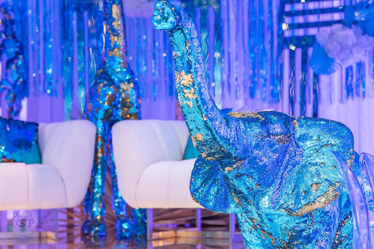 Glittery blue elephant at jungle theme baby shower | PartySlate