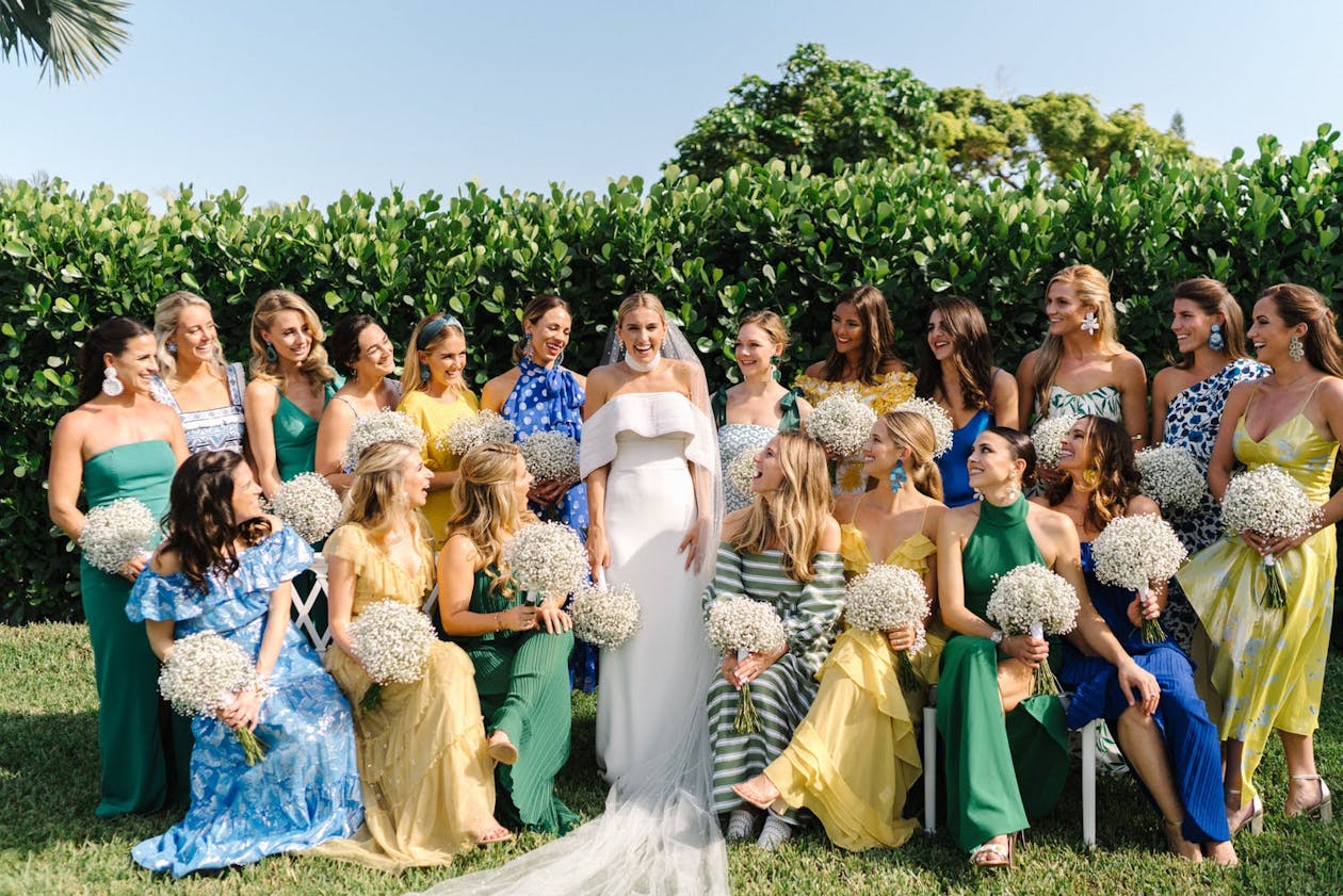 Bridal party in blue, yellow, and green | PartySlate