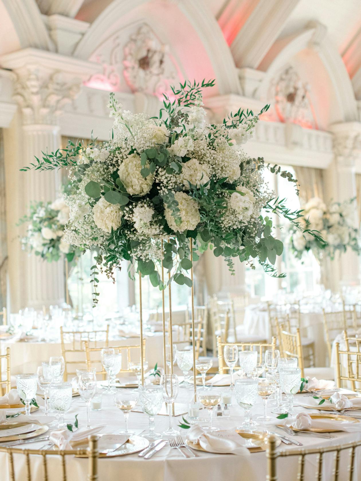 White and Green Tall Spring Wedding Centerpiece | PartySlate