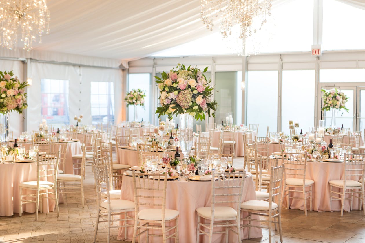 Spring Wedding Centerpiece With Pink Florals and White Roses and Greenery | PartySlate