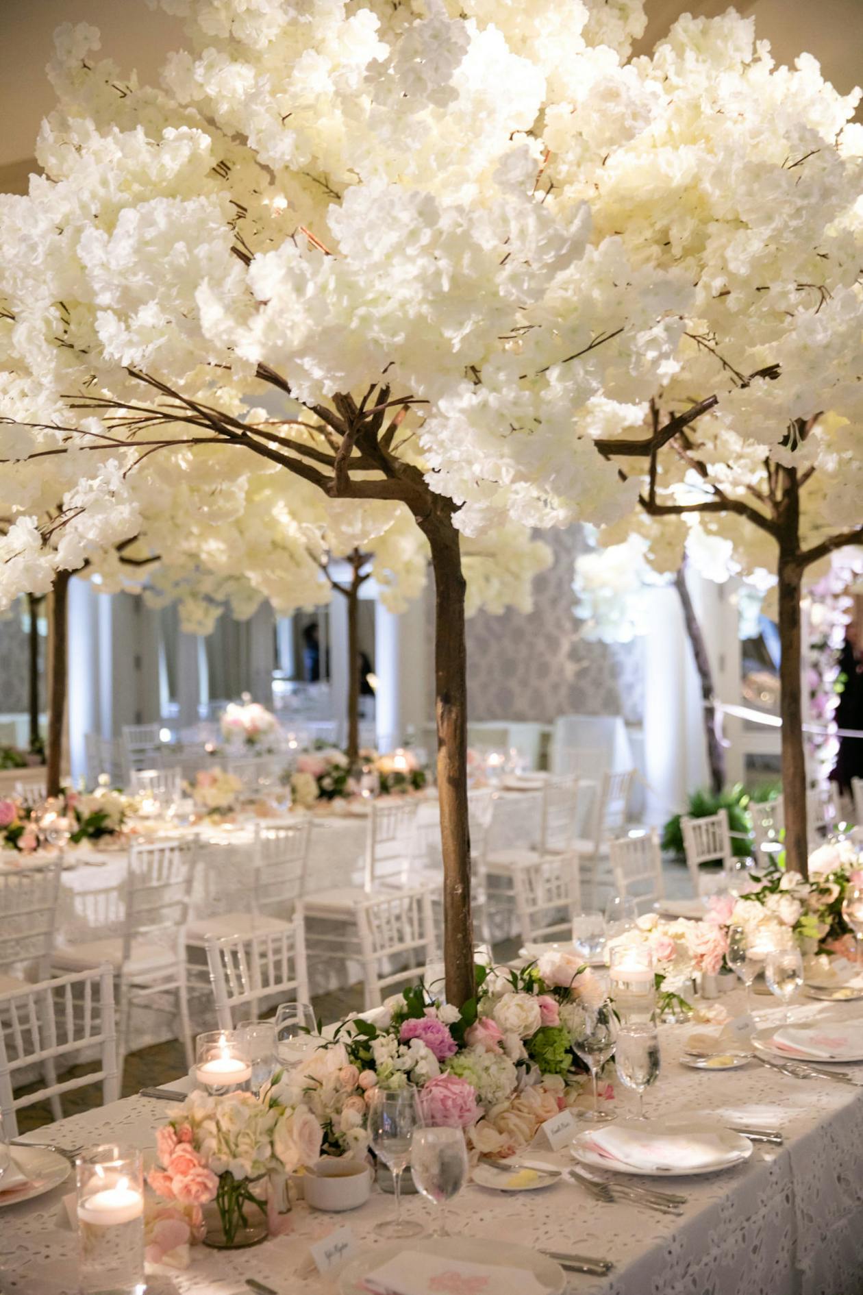 Spring Wedding With White Floral Trees on Table as Centerpiece | PartySlate